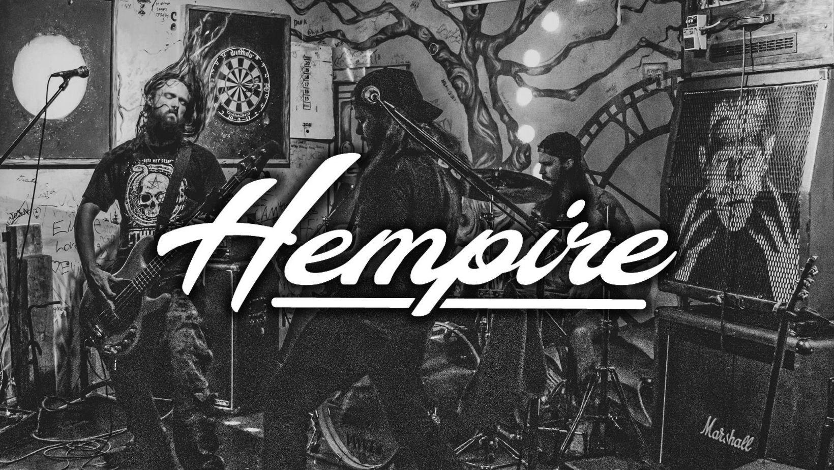 three band members and hempire logo